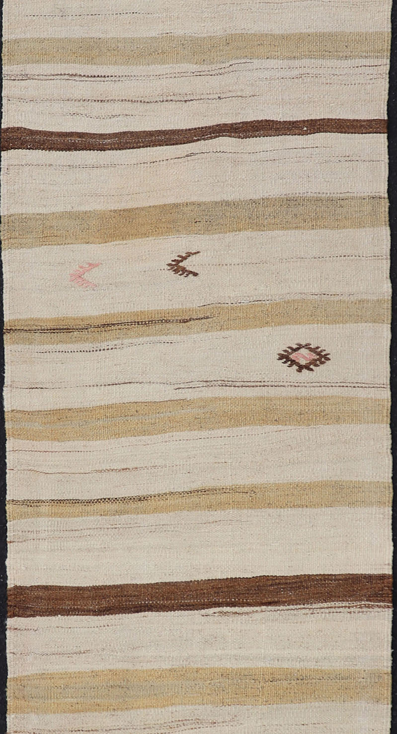 Minimalist design with traces of stripes Kilim runner in cream, light brown and taupe, Keivan Woven Arts / rug EN - 179919, country of origin / type: Turkey / Kilim, circa 1950 This flat - woven Kilim runner from Turkey features an understated compo... - Keivan Woven ArtsEN - 179919 - 17796Rug