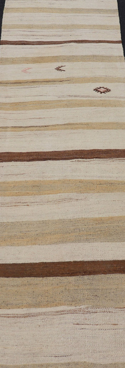 Minimalist design with traces of stripes Kilim runner in cream, light brown and taupe, Keivan Woven Arts / rug EN - 179919, country of origin / type: Turkey / Kilim, circa 1950 This flat - woven Kilim runner from Turkey features an understated compo... - Keivan Woven ArtsEN - 179919 - 17796Rug