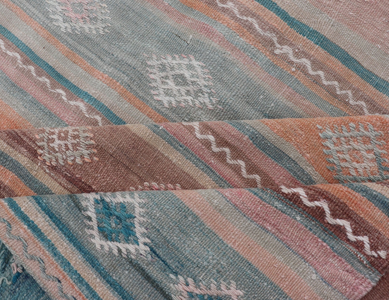Vintage Turkish Gallery Kilim runner with Stripes and Tribal Motifs in Muted colorful Tones. Keivan Woven Arts / rug EN - 179946, country of origin / type: Turkey / Kilim, circa Mid - 20th Century. Measures: 5'4 x 11'9 Woven during the mid - ... - Keivan Woven ArtsEN - 179946 - 15424Rug