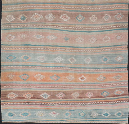 Vintage Turkish Gallery Kilim runner with Stripes and Tribal Motifs in Muted colorful Tones. Keivan Woven Arts / rug EN - 179946, country of origin / type: Turkey / Kilim, circa Mid - 20th Century. Measures: 5'4 x 11'9 Woven during the mid - ... - Keivan Woven ArtsEN - 179946 - 15424Rug