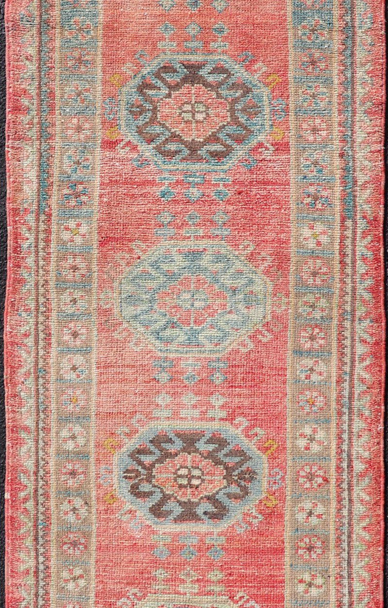 Vintage Hand Knotted Oushak Turkish Runner with Geometric Medallion Design Vintage Oushak runner from Turkey with Medallion design in various blue, soft red, brown, yellow and tan tones, Keivan Woven Arts / rug EN - 179957, country of origin / typ... - Keivan Woven ArtsEN - 179957 - 17682Rug