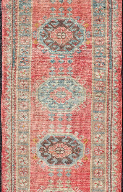 Vintage Hand Knotted Oushak Turkish Runner with Geometric Medallion Design Vintage Oushak runner from Turkey with Medallion design in various blue, soft red, brown, yellow and tan tones, Keivan Woven Arts / rug EN - 179957, country of origin / typ... - Keivan Woven ArtsEN - 179957 - 17682Rug