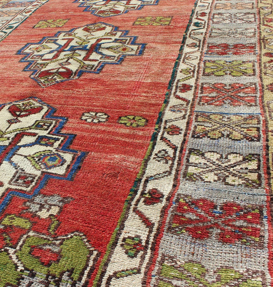 Green, blue and red vintage Turkish Oushak rug with three geometric medallions, rug en - 183, country of origin / type: Turkey / Oushak, circa 1940. This vintage Turkish Oushak gallery rug (circa mid - 20th century) features a unique blend of colors... - Keivan Woven ArtsEN - 183 - 5416