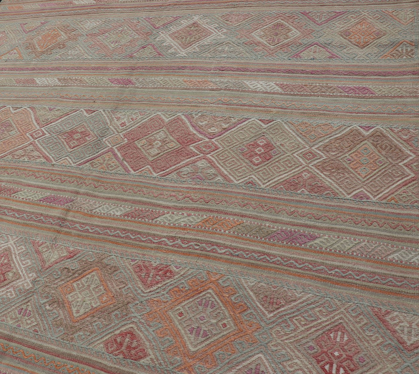 Colorful Vintage Embroidered Kilim with Stripes and Alternating Geometric Motifs. Keivan Woven Arts / rug EN - 2016, country of origin / type: Turkey / Kilim, circa 1950 Measures: 6'9 x 9'3 This vintage Kilim displays an array of designs, includin... - Keivan Woven ArtsEN - 2016 - 15314Rug