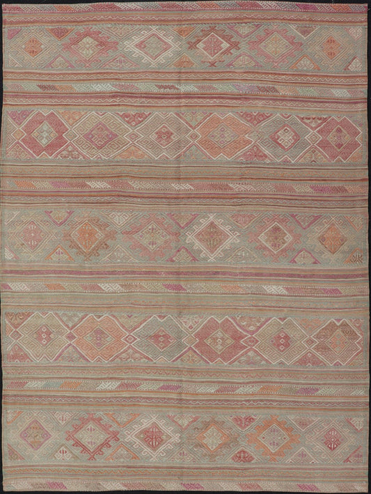 Colorful Vintage Embroidered Kilim with Stripes and Alternating Geometric Motifs. Keivan Woven Arts / rug EN - 2016, country of origin / type: Turkey / Kilim, circa 1950 Measures: 6'9 x 9'3 This vintage Kilim displays an array of designs, includin... - Keivan Woven ArtsEN - 2016 - 15314Rug