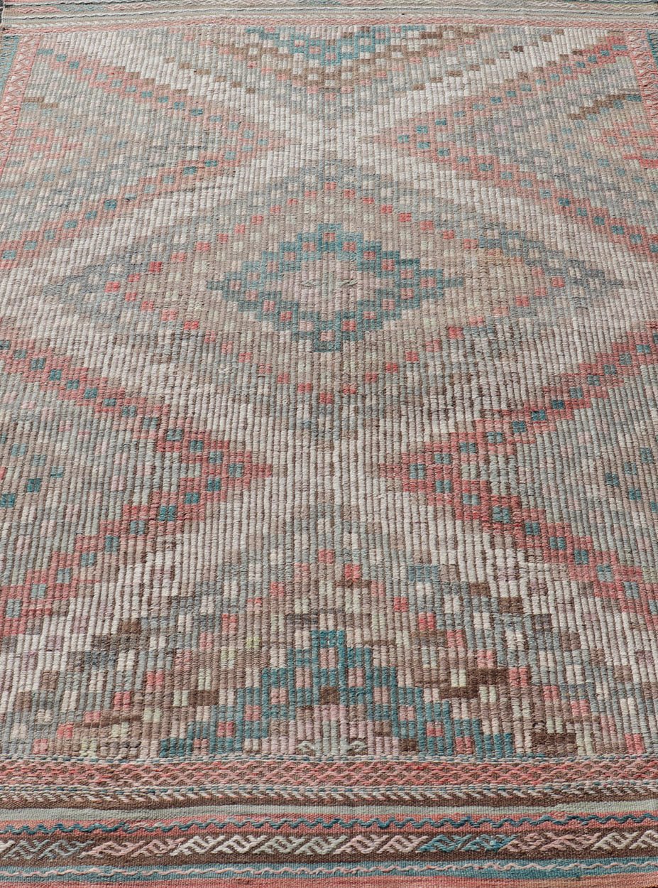 Vintage Embroidered Turkish Flat - Weave with Layered Diamond Design. Teal blue, brick red, pink, salmon, teal green, cream, soft buttery yellow and light green populates throughout this beautiful vintage embroidered Kilim rug from Turkey, rug EN... - Keivan Woven ArtsEN - 2395 - 14222Rug