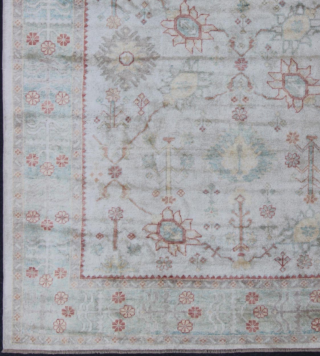 Antique Reproduction Turkish Oushak. Measures: 9'4 x 11'4. This sub geometric Oushak rug from Turkey features subdued colors in blue, light green, rust and, neutral color palette and an all - over design of floral shapes, surrounded beautifully by ... - Keivan Woven ArtsEN - 3264 - 5452Rug