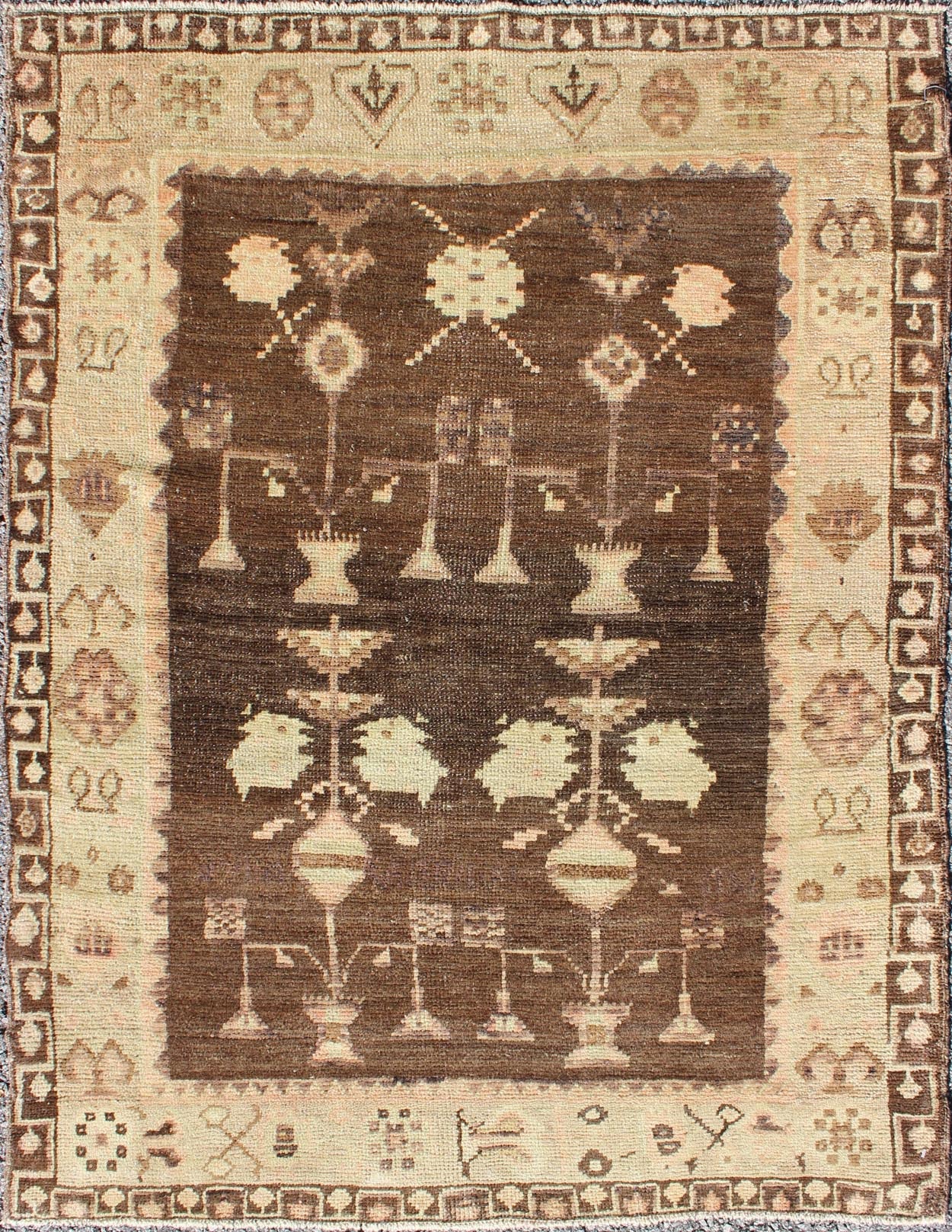 Vintage Turkish Oushak Carpet with Tribal Design Set on Brown Background Turkish Oushak Carpet with Tribal Design rug/en - 337 origin/turkey kwarugs This vintage Turkish Oushak rug features an intricately beautiful design. The various triba... - Keivan Woven ArtsEN - 337 - 4820Rug