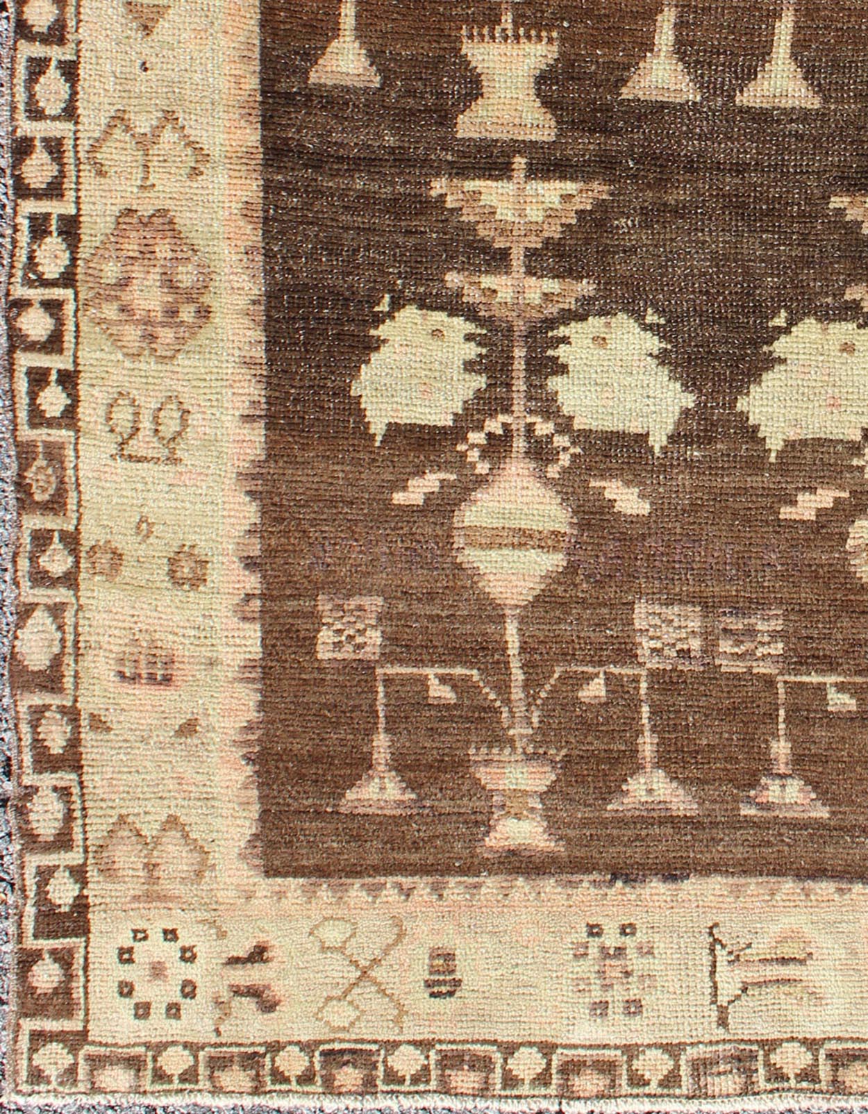 Vintage Turkish Oushak Carpet with Tribal Design Set on Brown Background Turkish Oushak Carpet with Tribal Design rug/en - 337 origin/turkey kwarugs This vintage Turkish Oushak rug features an intricately beautiful design. The various triba... - Keivan Woven ArtsEN - 337 - 4820Rug