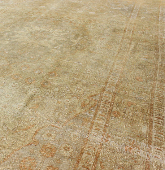 Faded Vintage Turkish Oushak Rug with Medallion, Florals and Taupe Background, rug en - 3960, country of origin / type: Turkey / Oushak, circa mid - 20th century This faded vintage Oushak rug (circa mid - 20th century) features an intricately beautifu... - Keivan Woven ArtsEN - 3960 - 110Rug