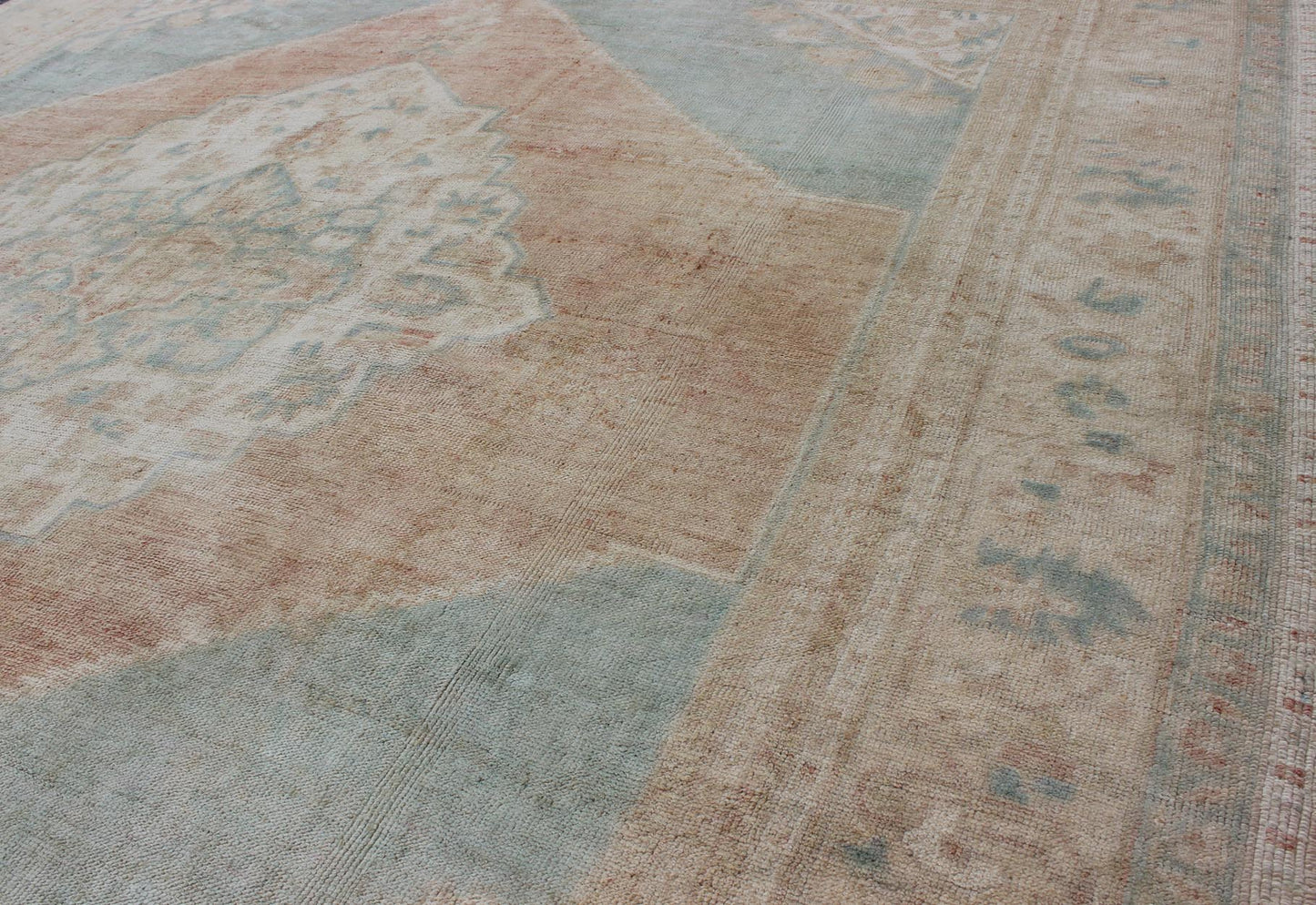 Light blue, topaz, faded grey and rust vintage Turkish Oushak rug in squared shape with layered Medallion, rug en - 4093, country of origin / type: Turkey / Oushak, circa 1930 This striking vintage Turkish Oushak rug bears a faded grey - colored bod... - Keivan Woven ArtsEN - 4093 - 1616Rug