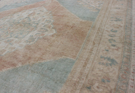 Light blue, topaz, faded grey and rust vintage Turkish Oushak rug in squared shape with layered Medallion, rug en - 4093, country of origin / type: Turkey / Oushak, circa 1930 This striking vintage Turkish Oushak rug bears a faded grey - colored bod... - Keivan Woven ArtsEN - 4093 - 1616Rug