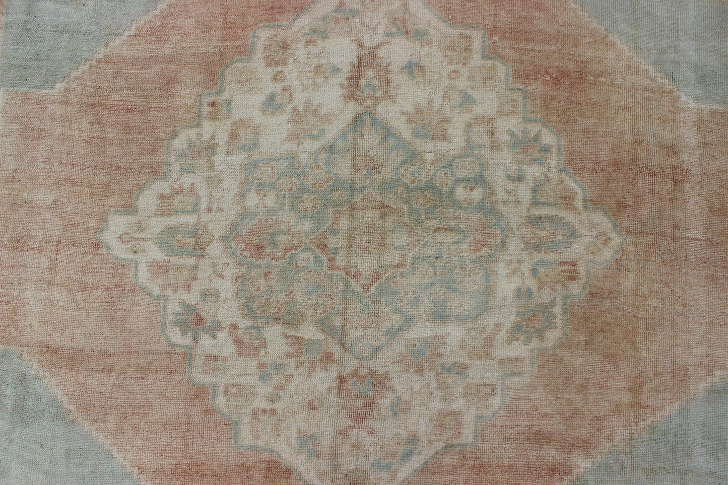 Light blue, topaz, faded grey and rust vintage Turkish Oushak rug in squared shape with layered Medallion, rug en - 4093, country of origin / type: Turkey / Oushak, circa 1930 This striking vintage Turkish Oushak rug bears a faded grey - colored bod... - Keivan Woven ArtsEN - 4093 - 1616Rug