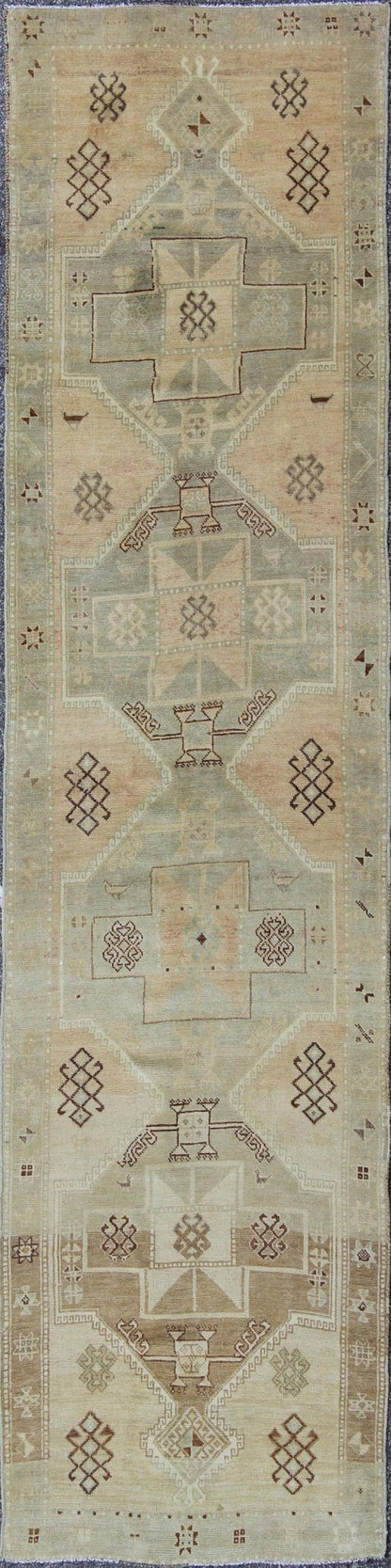 Mid - Century Vintage Turkish Oushak Runner with Geometric Tribal Medallions, rug en - 4261, country of origin / type: Turkey / Oushak, circa mid - 20th century This vintage Turkish Oushak gallery rug (circa mid - 20th century) features a unique blend o... - Keivan Woven ArtsEN - 4261 - 4888Rug