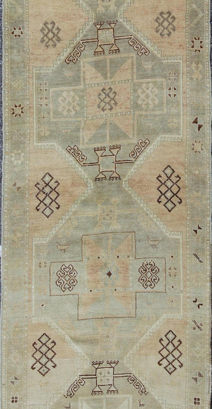 Mid - Century Vintage Turkish Oushak Runner with Geometric Tribal Medallions, rug en - 4261, country of origin / type: Turkey / Oushak, circa mid - 20th century This vintage Turkish Oushak gallery rug (circa mid - 20th century) features a unique blend o... - Keivan Woven ArtsEN - 4261 - 4888Rug