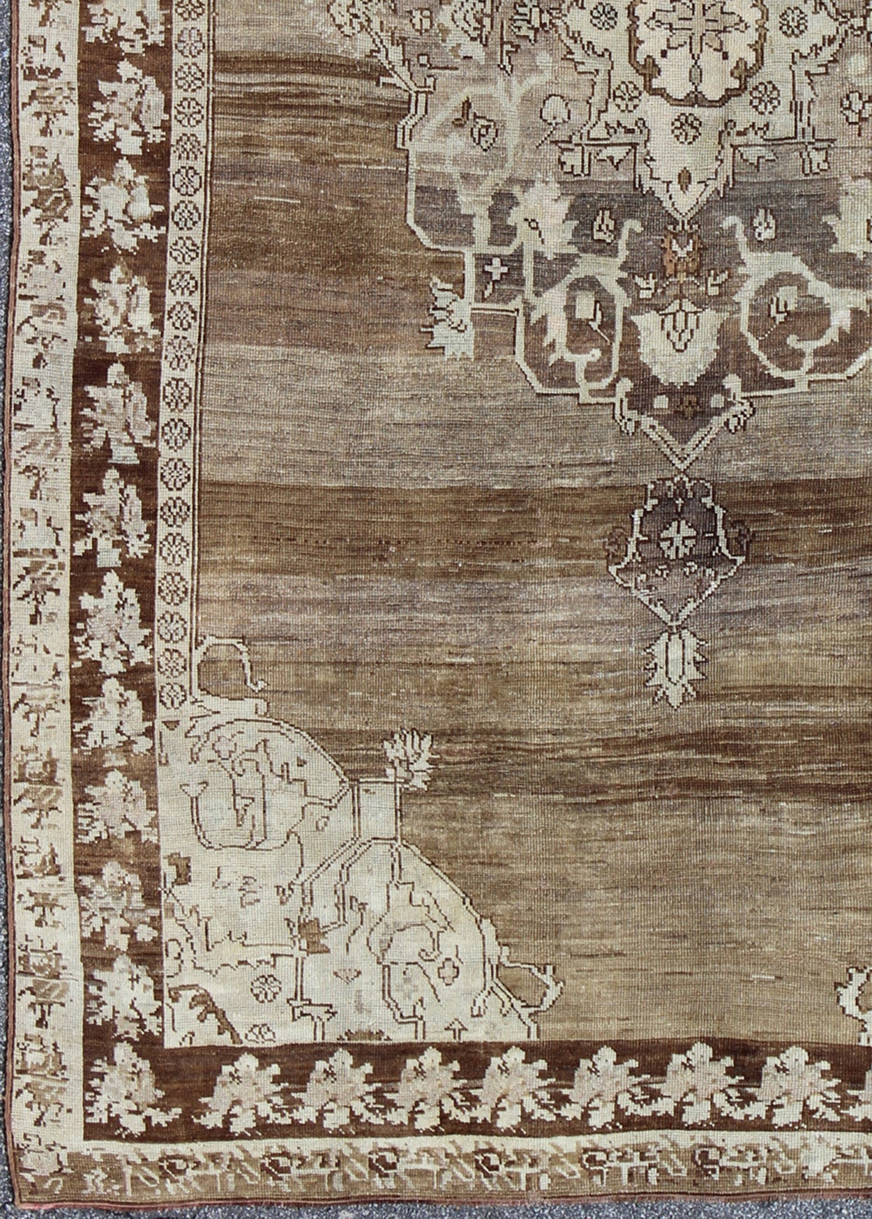 Unique Turkish Kars Carpet in Brown, Gray,and Ivory This striking and unique carpet combines a traditional center field with an Art Deco border and features a color palette including brown, cream, and ivory. Measures: 8'0 x 12'5. - Keivan Woven ArtsEN - 4607 - 1636Rug