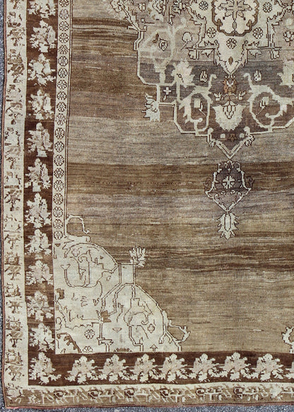 Unique Turkish Kars Carpet in Brown, Gray,and Ivory This striking and unique carpet combines a traditional center field with an Art Deco border and features a color palette including brown, cream, and ivory. Measures: 8'0 x 12'5. - Keivan Woven ArtsEN - 4607 - 1636Rug