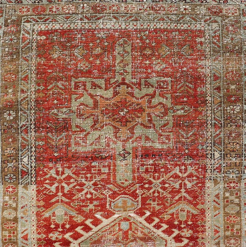 Measures: 2'8 x 10'6 Antique Persian Heriz Distressed Runner with Geometric Medallions in Soft Colors. rug EN - 4651, country of origin / type: Iran / Heriz, circa 1920 This antique Persian Heriz runner, from northwest Iran, displays a geometr... - Keivan Woven ArtsEN - 4651 - 19881Rug