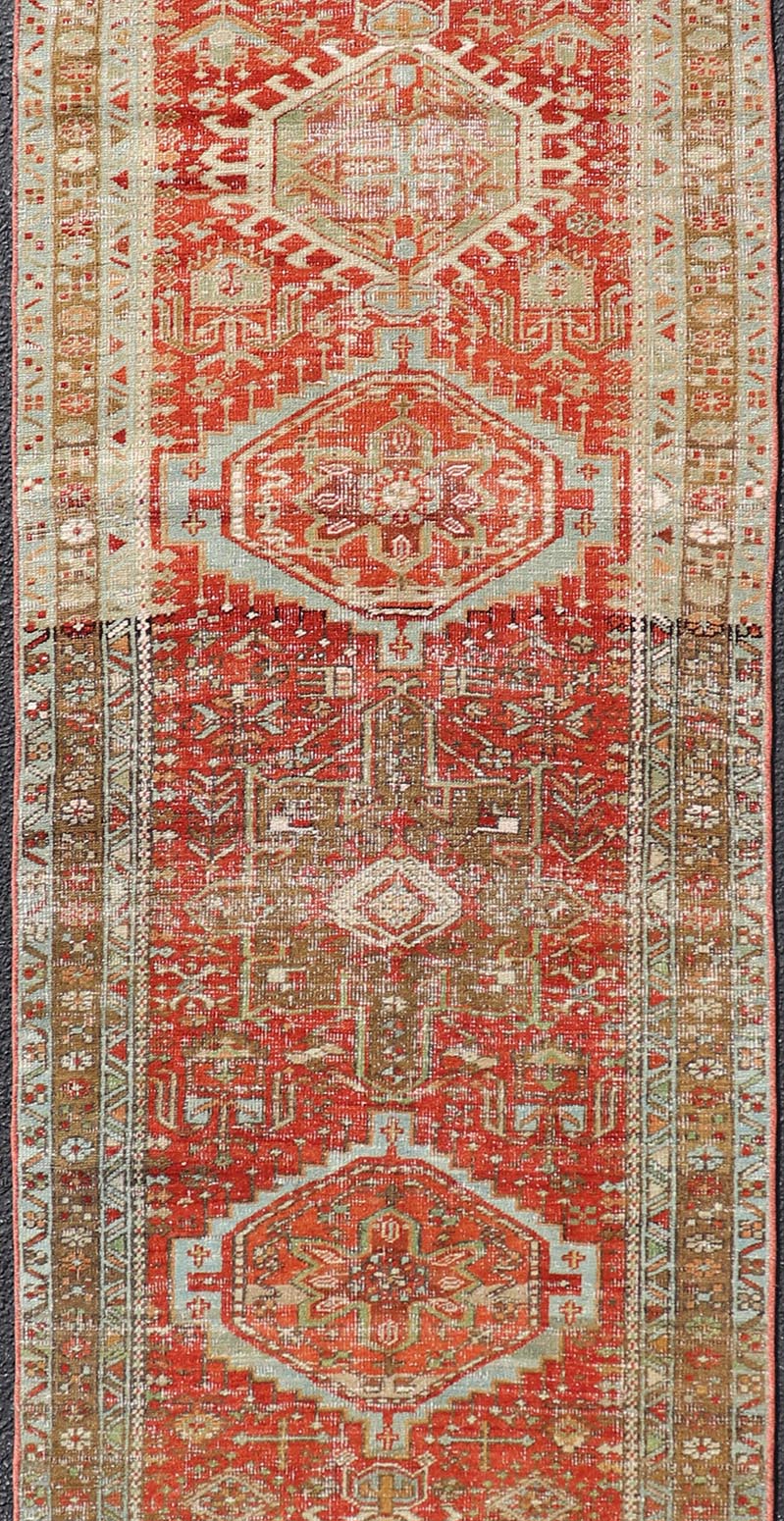 Measures: 2'8 x 10'6 Antique Persian Heriz Distressed Runner with Geometric Medallions in Soft Colors. rug EN - 4651, country of origin / type: Iran / Heriz, circa 1920 This antique Persian Heriz runner, from northwest Iran, displays a geometr... - Keivan Woven ArtsEN - 4651 - 19881Rug