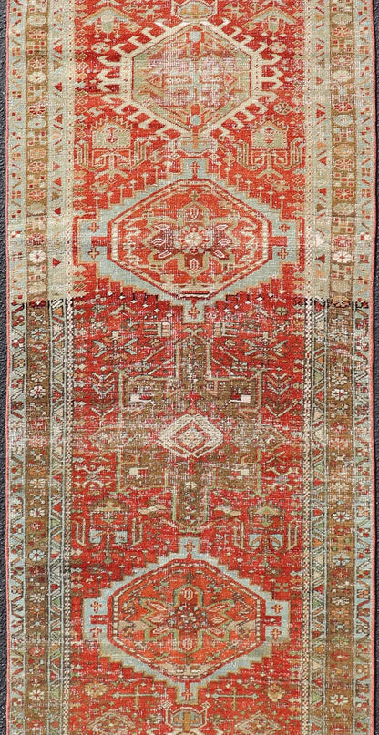 Measures: 2'8 x 10'6 Antique Persian Heriz Distressed Runner with Geometric Medallions in Soft Colors. rug EN - 4651, country of origin / type: Iran / Heriz, circa 1920 This antique Persian Heriz runner, from northwest Iran, displays a geometr... - Keivan Woven ArtsEN - 4651 - 19881Rug