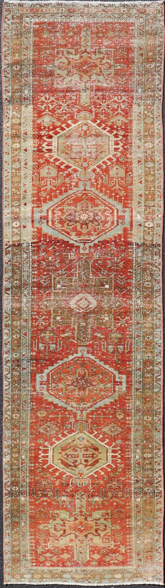 Measures: 2'8 x 10'6 Antique Persian Heriz Distressed Runner with Geometric Medallions in Soft Colors. rug EN - 4651, country of origin / type: Iran / Heriz, circa 1920 This antique Persian Heriz runner, from northwest Iran, displays a geometr... - Keivan Woven ArtsEN - 4651 - 19881