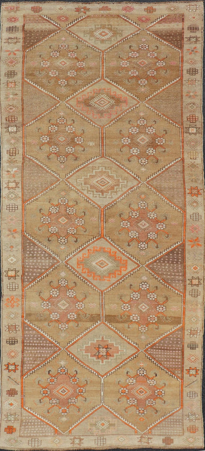 Vintage Turkish Kars Gallery Runner in Brown Color, Tan, Taupe and Orange. Keivan Woven Arts rug EN - 4655, country of origin / type: Turkey / Kars, circa 1950 Measures: 5'9 x 13'4 This vintage gallery runner features an assortment of tribal and g... - Keivan Woven ArtsEN - 4655 - 17436Rug
