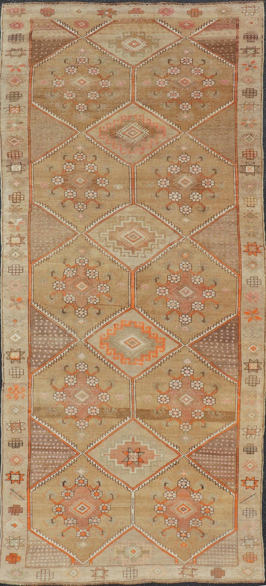 Vintage Turkish Kars Gallery Runner in Brown Color, Tan, Taupe and Orange. Keivan Woven Arts rug EN - 4655, country of origin / type: Turkey / Kars, circa 1950 Measures: 5'9 x 13'4 This vintage gallery runner features an assortment of tribal and g... - Keivan Woven ArtsEN - 4655 - 17436Rug