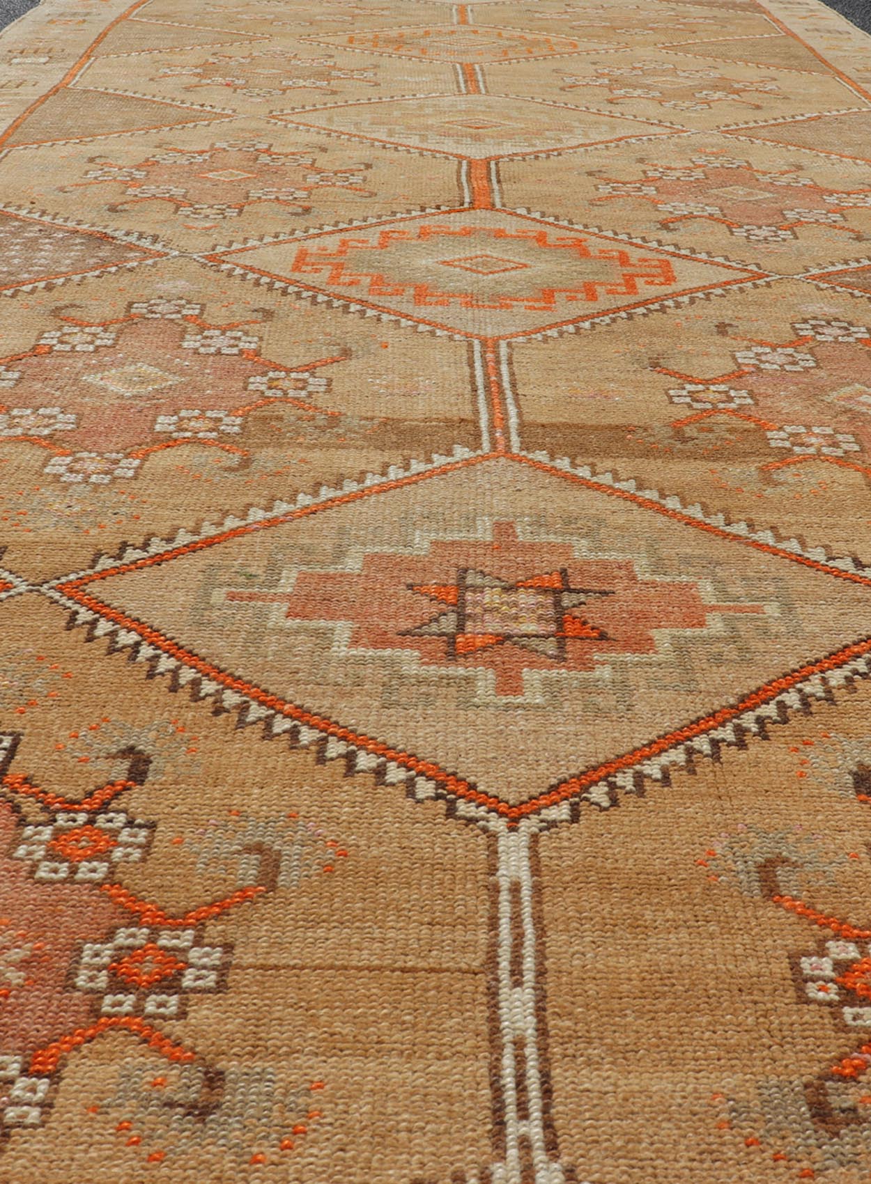 Vintage Turkish Kars Gallery Runner in Brown Color, Tan, Taupe and Orange. Keivan Woven Arts rug EN - 4655, country of origin / type: Turkey / Kars, circa 1950 Measures: 5'9 x 13'4 This vintage gallery runner features an assortment of tribal and g... - Keivan Woven ArtsEN - 4655 - 17436Rug