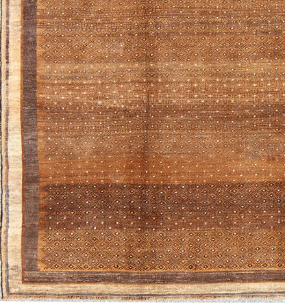 Vintage Turkish Kars Rug With All - Over Small Tribal Design in Shades of Brown's. Keivan Woven Arts / rug EN - 484, country of origin / type: Turkey / Oushak, circa mid - 20th century. Set on a brown field with an all - over modern/tribal pattern, this... - Keivan Woven ArtsEN - 484 - 4416Rug