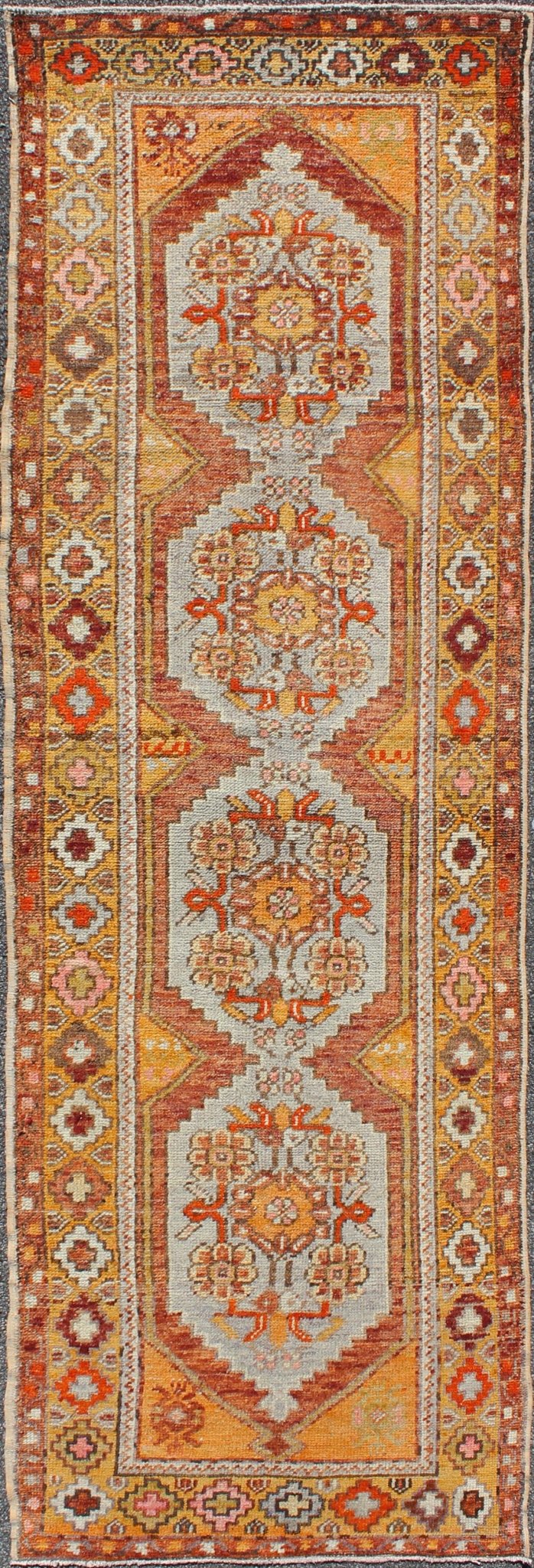 Colorful Antique Oushak Runner with Four Medallions in Yellow, Red, Green, Gray, rug en - 486, country of origin / type: turkey / Oushak, circa 1930s This beautiful antique Oushak runner from early 20th century turkey features a classic Oushak des... - Keivan Woven ArtsEN - 486 - 3407Rug