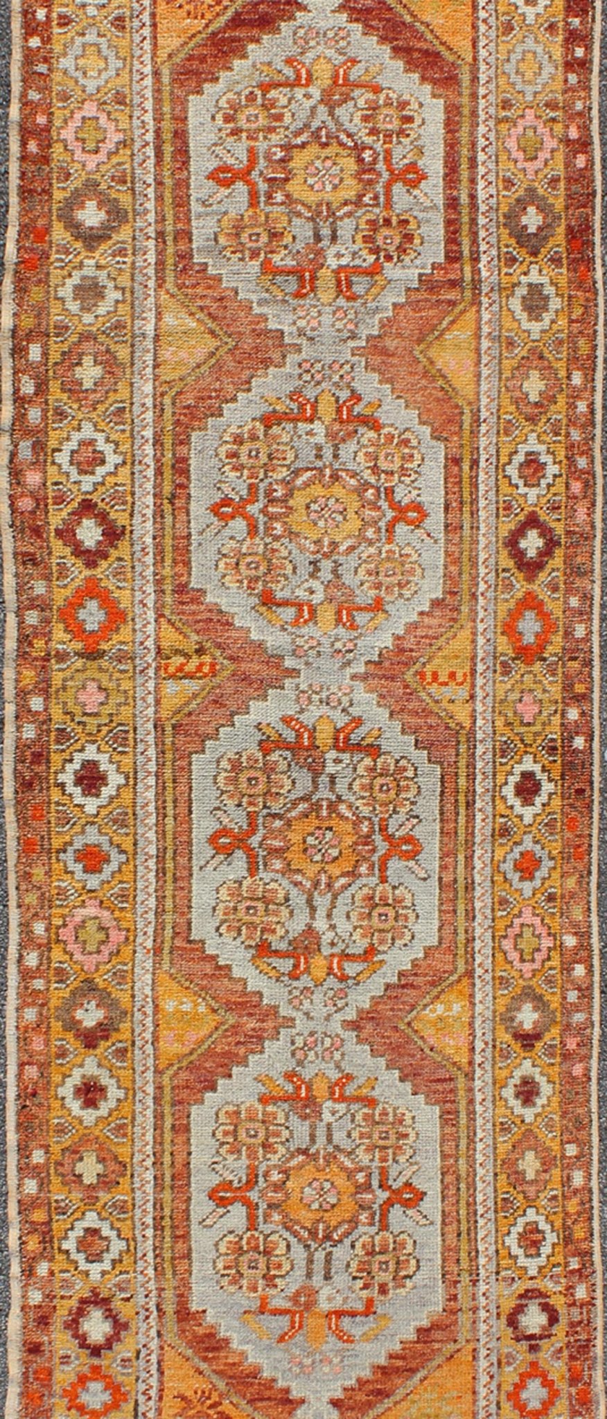 Colorful Antique Oushak Runner with Four Medallions in Yellow, Red, Green, Gray, rug en - 486, country of origin / type: turkey / Oushak, circa 1930s This beautiful antique Oushak runner from early 20th century turkey features a classic Oushak des... - Keivan Woven ArtsEN - 486 - 3407Rug