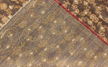 All - Over Floral Wreath Design Turkish Oushak Rug with Brown Background Measures: 4'5 x 7'4 The design of this beautiful vintage Oushak rug from mid - 20th century Turkey is enhanced by its rich colored wool. The brown ground is home to an a... - Keivan Woven ArtsEN - 534 - 3678Rug