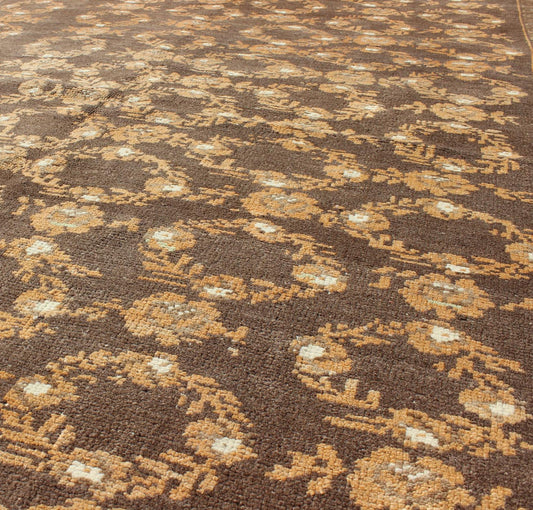 All - Over Floral Wreath Design Turkish Oushak Rug with Brown Background Measures: 4'5 x 7'4 The design of this beautiful vintage Oushak rug from mid - 20th century Turkey is enhanced by its rich colored wool. The brown ground is home to an a... - Keivan Woven ArtsEN - 534 - 3678Rug