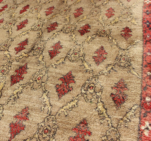 Mid Century Tulu Carpet in Sand color background. This mid century Tulu rug features repeating red motifs laid across a sand - colored field and enclosed within similarly - colored frames. Tulu rugs were woven in Konya area, in central Anato... - Keivan Woven ArtsEN - 623 - 4842Rug