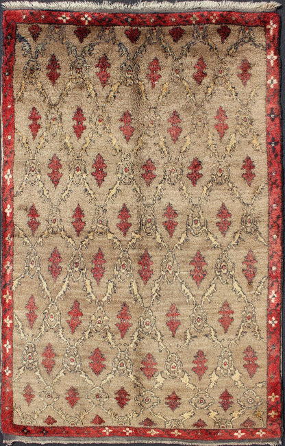 Mid Century Tulu Carpet in Sand color background. This mid century Tulu rug features repeating red motifs laid across a sand - colored field and enclosed within similarly - colored frames. Tulu rugs were woven in Konya area, in central Anato... - Keivan Woven ArtsEN - 623 - 4842Rug