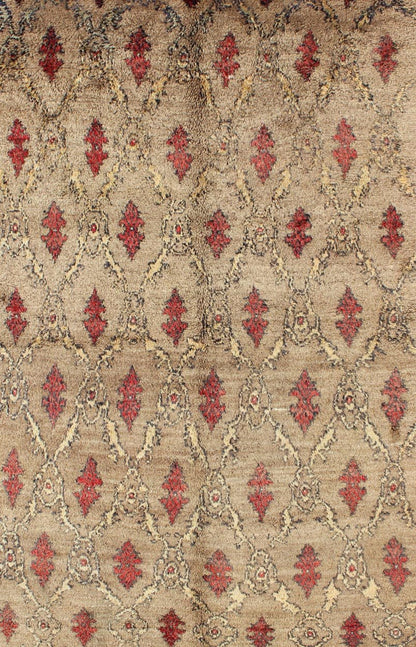 Mid Century Tulu Carpet in Sand color background. This mid century Tulu rug features repeating red motifs laid across a sand - colored field and enclosed within similarly - colored frames. Tulu rugs were woven in Konya area, in central Anato... - Keivan Woven ArtsEN - 623 - 4842Rug