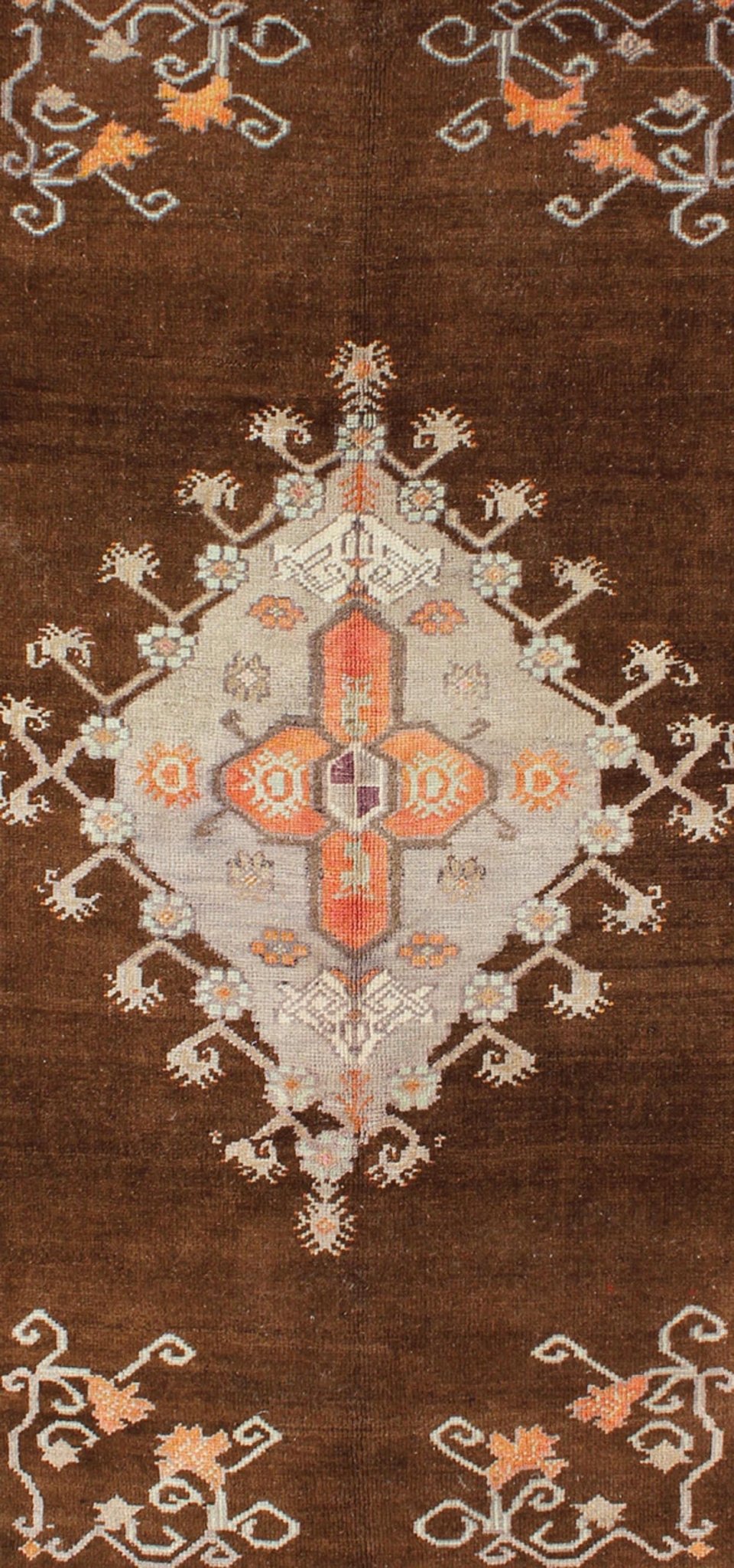 Vintage Turkish Medallion Oushak in Brown, Taupe, Gray, silver and Orange Measures: 5'1 x 8'10 This Turkish Oushak features a chocolate - brown background with a light gray and taupe border. The vibrant pop of orange color balances beautifu... - Keivan Woven ArtsEN - 6301 - 3824Rug