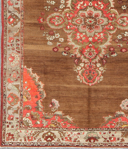 Vintage Turkish Rug with Unique Colors in Brown, Taupe, Green and Gray Measures: 8'8 x 11'3. This very unique carpet, from eastern Turkey, displays a brown background with a gray/taupe border. The orange corners add vibrancy to the rug whil... - Keivan Woven ArtsEN - 677 - 3830Rug