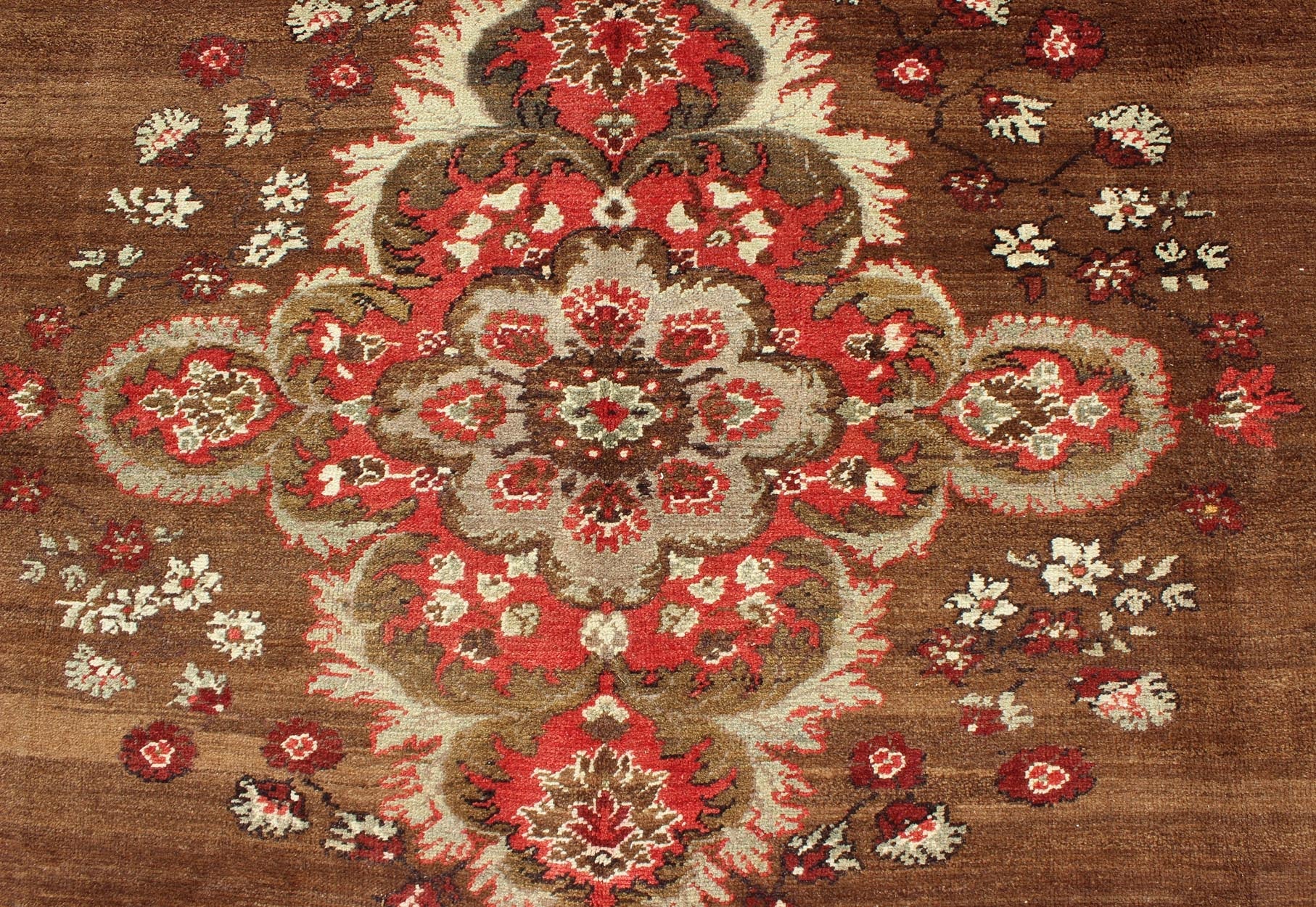 Vintage Turkish Rug with Unique Colors in Brown, Taupe, Green and Gray Measures: 8'8 x 11'3. This very unique carpet, from eastern Turkey, displays a brown background with a gray/taupe border. The orange corners add vibrancy to the rug whil... - Keivan Woven ArtsEN - 677 - 3830Rug