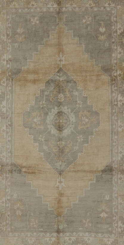 Muted Mid - 20th Century Vintage Oushak Rug with Medallion in Camel Measures: 5'5 x 9'4 This muted Turkish Oushak rests beautifully on a grounded camel - colored field. An understated medallion is well - balanced by four organic corner motifs, ... - Keivan Woven ArtsEN - 721 - 9236Rug