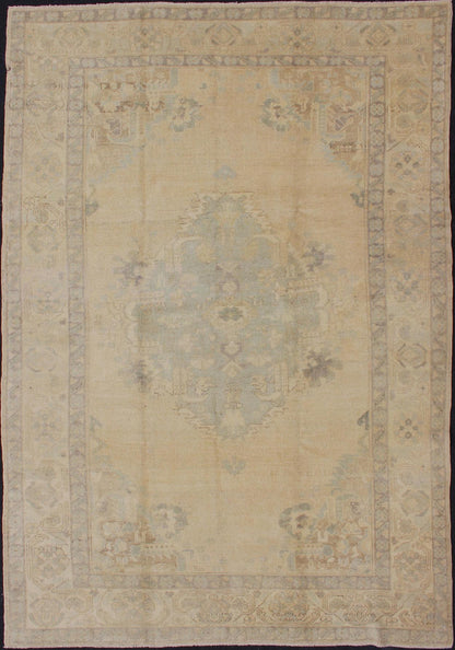 Oushak Vintage Turkish rug with faded central medallion in cream, soft yellow, accent light blue and muted tones, rug en - 741, country of origin / type: Turkey / Oushak, circa mid - 20th century This muted vintage Turkish Oushak carpet (circa mid - 2... - Keivan Woven ArtsEN - 741 - 4862Rug