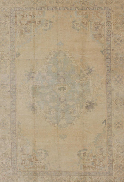 Oushak Vintage Turkish rug with faded central medallion in cream, soft yellow, accent light blue and muted tones, rug en - 741, country of origin / type: Turkey / Oushak, circa mid - 20th century This muted vintage Turkish Oushak carpet (circa mid - 2... - Keivan Woven ArtsEN - 741 - 4862Rug