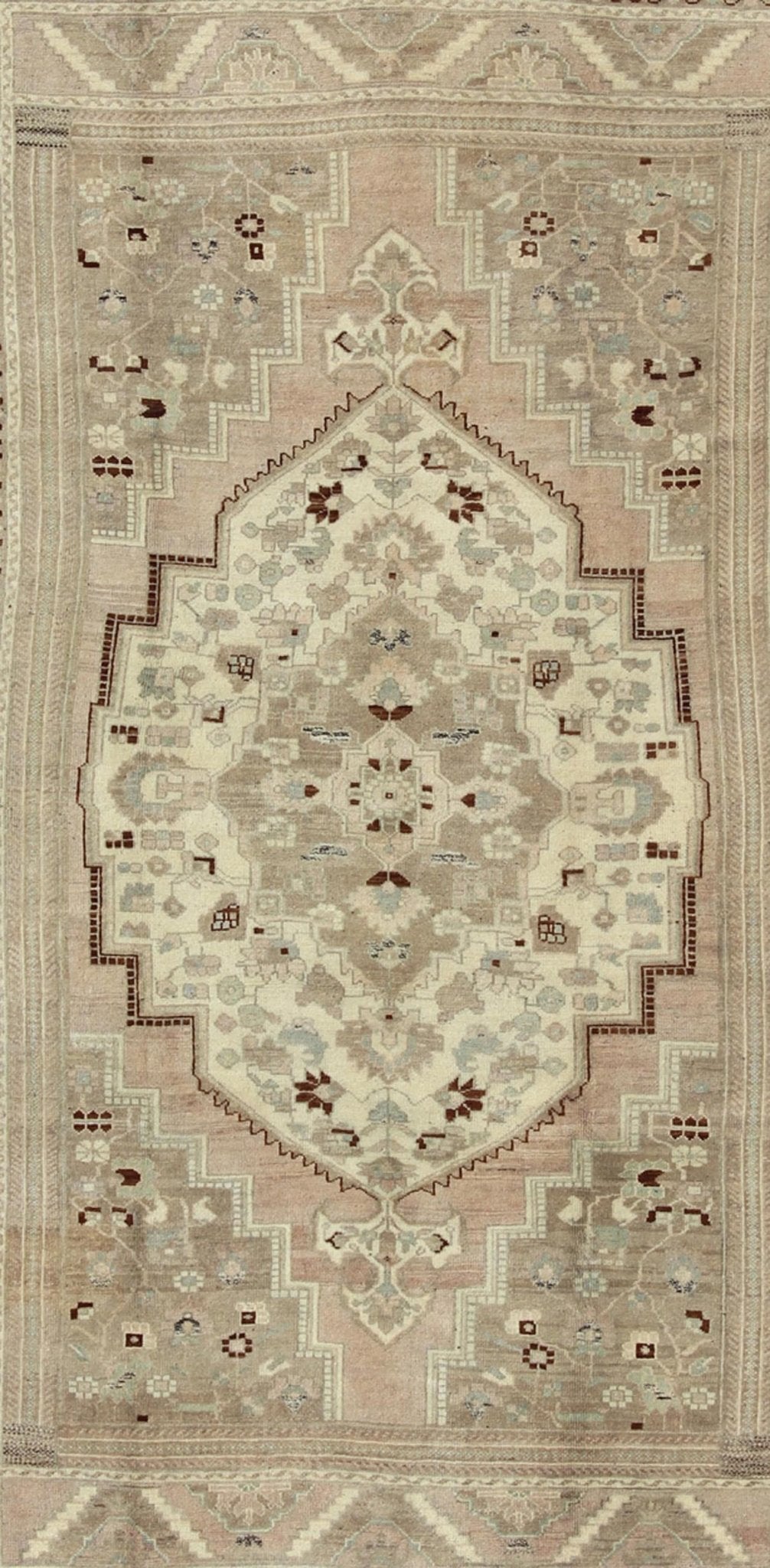 Charming Vintage Oushak Rug in Brown Border, Taupe, Blush and Gray/Green This rug showcases a large central medallion surrounded by a gentle pink color. A cream medallion is filled with floral designs of pale blue, light green, and shades of ne... - Keivan Woven ArtsEN - 786 - 3806Rug