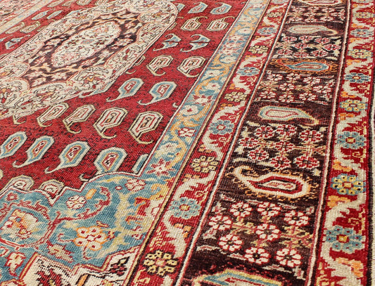 Antique Turkish Oushak Rug This stunning antique Turkish Oushak was beautifully handcrafted during the early part of the 20th Century. A regal sub - geometric design and center medallion rests upon a field of red. An intricate, broad border surrou... - Keivan Woven ArtsEN - 86834 - 898Rug