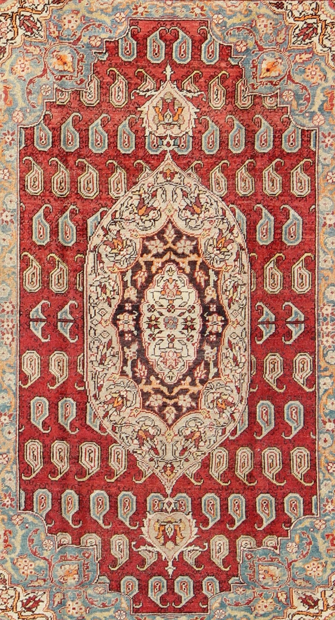 Antique Turkish Oushak Rug This stunning antique Turkish Oushak was beautifully handcrafted during the early part of the 20th Century. A regal sub - geometric design and center medallion rests upon a field of red. An intricate, broad border surrou... - Keivan Woven ArtsEN - 86834 - 898Rug