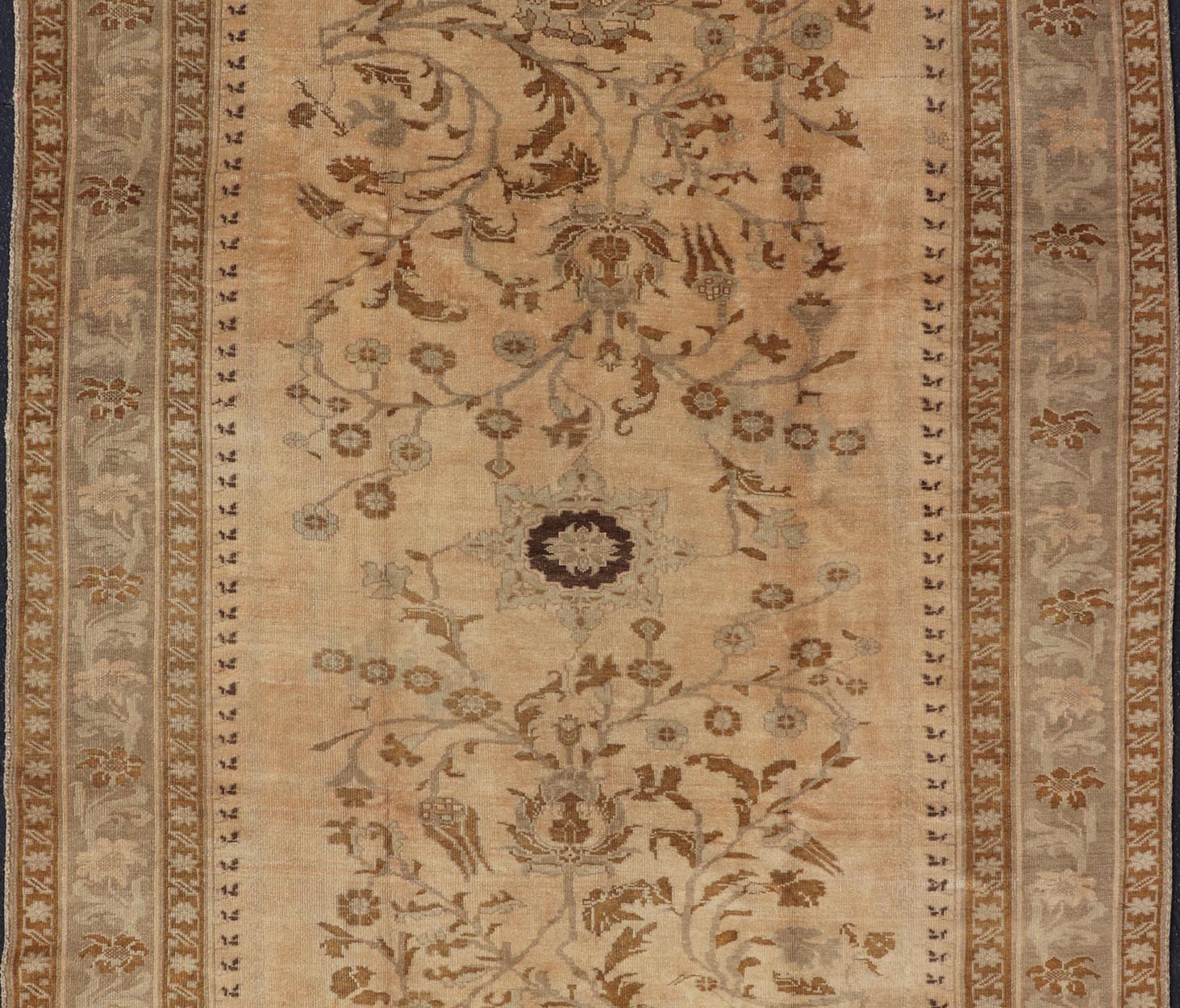 Vintage Turkish Oushak Rug with Detailed Vines and Flowers Measures: 6'9 x 9'11 The Oushak wool rug features two oversized medallions with detailed vines and flowers. A framework of floral motifs and stylized branches form the border and ... - Keivan Woven ArtsEN - 87601 - 870Rug