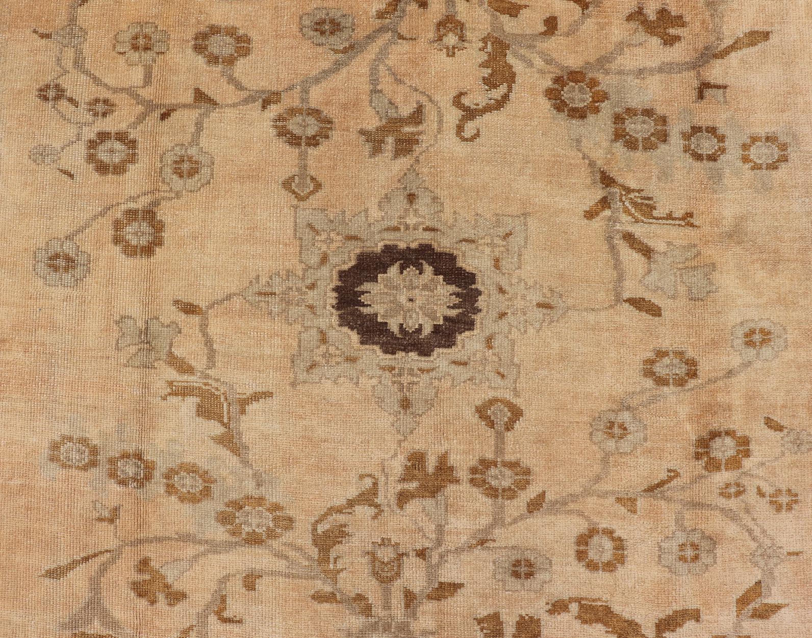 Vintage Turkish Oushak Rug with Detailed Vines and Flowers Measures: 6'9 x 9'11 The Oushak wool rug features two oversized medallions with detailed vines and flowers. A framework of floral motifs and stylized branches form the border and ... - Keivan Woven ArtsEN - 87601 - 870Rug