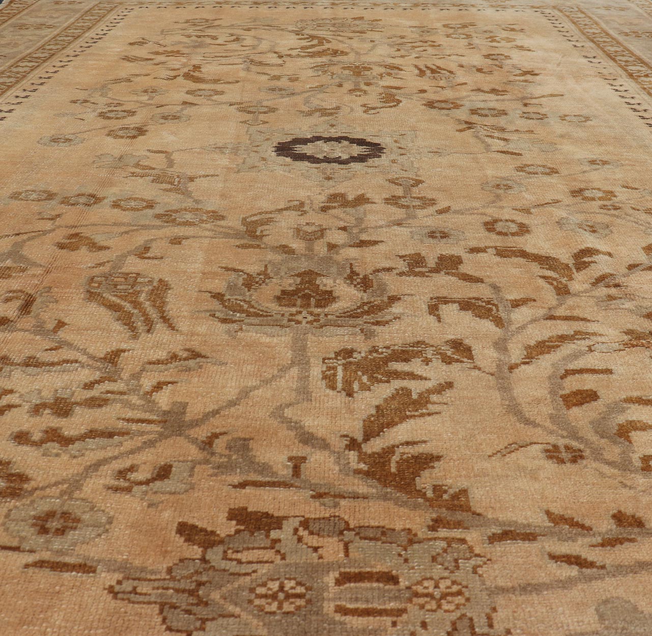 Vintage Turkish Oushak Rug with Detailed Vines and Flowers Measures: 6'9 x 9'11 The Oushak wool rug features two oversized medallions with detailed vines and flowers. A framework of floral motifs and stylized branches form the border and ... - Keivan Woven ArtsEN - 87601 - 870Rug