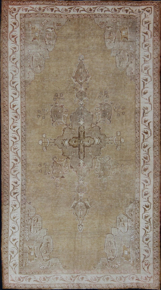 Vintage Turkish Kars Gallery Rug With Earthy Color Palette and Ivory Border Turkish rug from Kars Area with Medallion design, rug en - 92120, country of origin / type: Turkey / Kars, circa 1940 This beautiful vintage Turkish carpet is highly d... - Keivan Woven ArtsEN - 92120 - 2396Rug