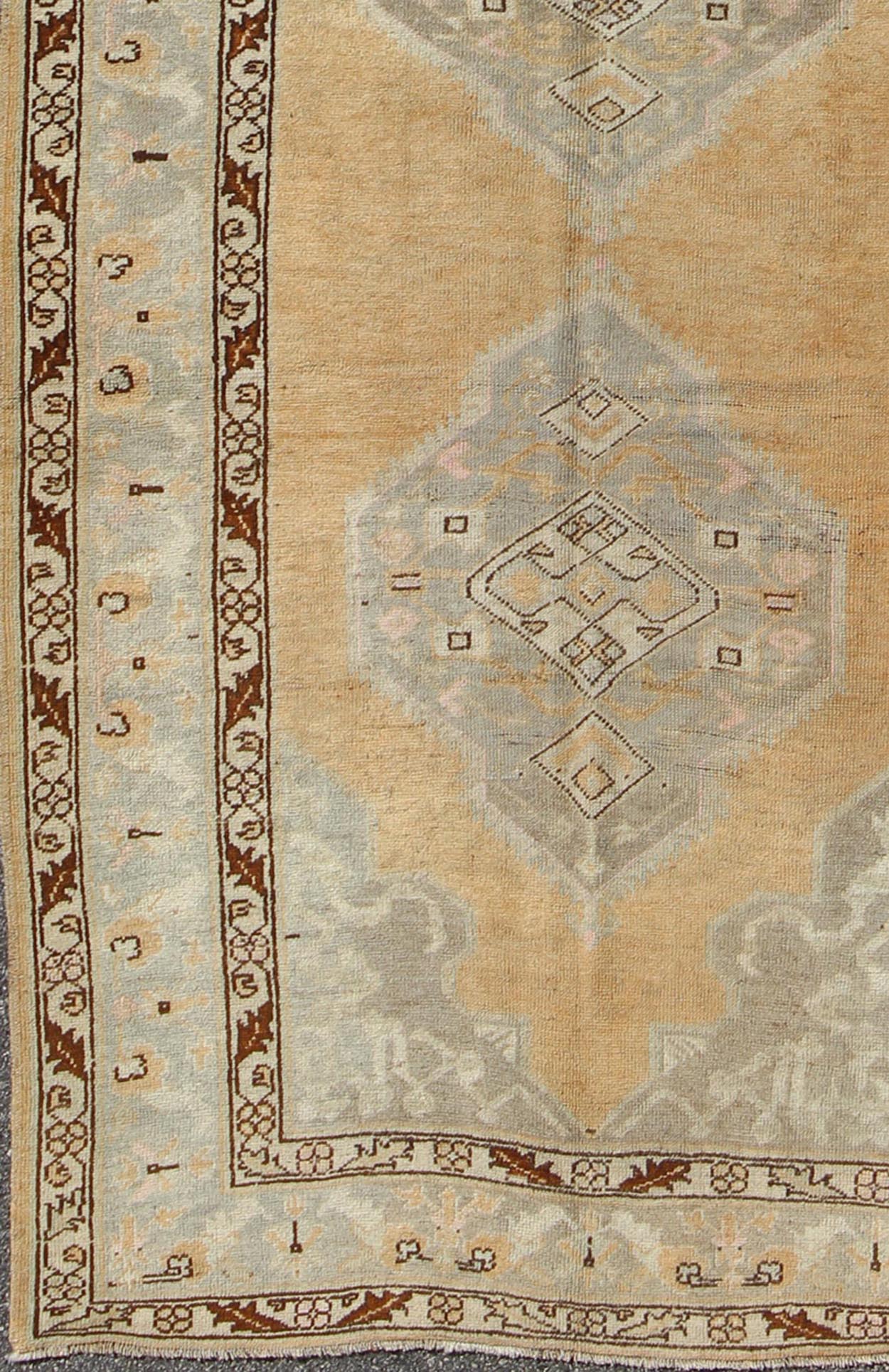 Vintage Turkish Oushak Runner With Stylized Medallions in Golden Peach, Light Green and Brown. rug en - 92478, country of origin / type: Turkey / Oushak, circa 1940 This vintage Turkish Oushak gallery runner (circa mid - 20th century) features a uni... - Keivan Woven ArtsEN - 92478 - 1454Rug